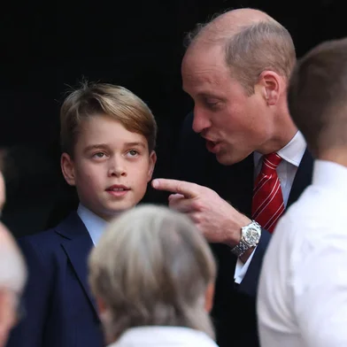 Patron of the Welsh Rugby Union Britain's Prince William, Prince of Wales (CR) talks with his son Prince George of Wales (CL) during the France 2023 Rugby World Cup quarter-final match between Wales and Argentina at the Stade Velodrome in Marseille, south-eastern France, on October 14, 2023. (Photo by Pascal GUYOT / AFP)Editoria: SPOLocal: MarseilleIndexador: PASCAL GUYOTSecao: rugby unionFonte: AFPFotógrafo: STF<!-- NICAID(15569759) -->