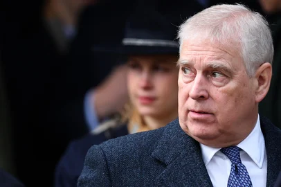 (FILES) Britain's Prince Andrew, Duke of York leaves after attending for the Royal Family's traditional Christmas Day service at St Mary Magdalene Church in Sandringham in eastern England, on December 25, 2023. UK police said February 19, 2026, officers were searching two addresses, one in eastern England and one west of London, following the arrest of ex-Prince Andrew on suspicion of misconduct in a public office. (Photo by Adrian DENNIS / AFP)<!-- NICAID(16228190) -->