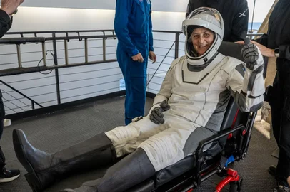 TALLAHASSEE, FLORIDA, MARCH 18: (EDITOR'S NOTE: This handout image was provided by a third-party organization and may not adhere to Getty Images' editorial policy) In this handout image provided by the National Aeronautics and Space Administration (NASA), NASA astronaut Suni Williams is helped out of the SpaceX Dragon spacecraft onboard the SpaceX recovery ship MEGAN after she and fellow NASA astronauts Nick Hague and Butch Wilmore, and Roscosmos cosmonaut Aleksandr Gorbunov landed on the water on March 18, 2025 off the coast of Tallahassee, Florida. Williams and Wilmore were returning from a stay onboard the International Space Station that began in June 2024. Keegan Barber/NASA via Getty Images/AFPNASA / GETTY IMAGES NORTH AMERICA / Getty Images via AFP<!-- NICAID(15998406) -->