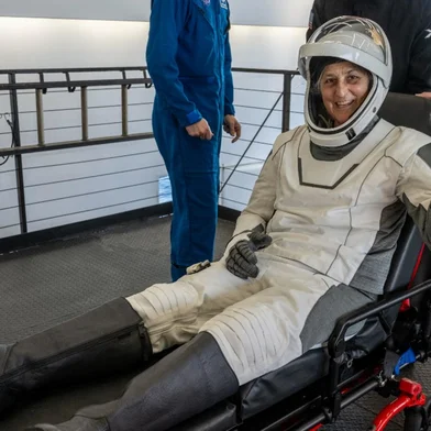 TALLAHASSEE, FLORIDA, MARCH 18: (EDITOR'S NOTE: This handout image was provided by a third-party organization and may not adhere to Getty Images' editorial policy) In this handout image provided by the National Aeronautics and Space Administration (NASA), NASA astronaut Suni Williams is helped out of the SpaceX Dragon spacecraft onboard the SpaceX recovery ship MEGAN after she and fellow NASA astronauts Nick Hague and Butch Wilmore, and Roscosmos cosmonaut Aleksandr Gorbunov landed on the water on March 18, 2025 off the coast of Tallahassee, Florida. Williams and Wilmore were returning from a stay onboard the International Space Station that began in June 2024. Keegan Barber/NASA via Getty Images/AFPNASA / GETTY IMAGES NORTH AMERICA / Getty Images via AFP<!-- NICAID(15998406) -->