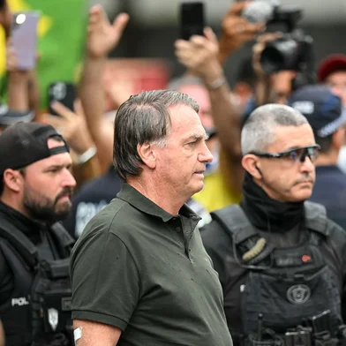 Former Brazilian President (2019-2022) Jair Bolsonaro leaves the DF Star hospital in Brasilia on September 14, 2025, after undergoing a series of medical examinations, as he remains under house arrest. Brazil's Supreme Court on September 11 sentenced firebrand ex-president Jair Bolsonaro to 27 years in prison for coup plotting at the end of a landmark trial that divided the nation and drew US fury. (Photo by EVARISTO SA / AFP)Editoria: POLLocal: BrasíliaIndexador: EVARISTO SASecao: trialsFonte: AFPFotógrafo: STF<!-- NICAID(16125814) -->