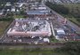 Imagem aérea mostra pavilhão de indústria destruído em Cachoeirinha; postes caíram e escolas foram destelhadas