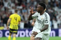 Real Madrid's Brazilian forward #07 Vinicius Junior celebrates scoring a hat-trick and his team's fifth goal during the UEFA Champions League, league phase day 3 football match between Real Madrid CF and Borussia Dortmund at the Santiago Bernabeu stadium in Madrid on October 22, 2024. (Photo by Thomas COEX / AFP)<!-- NICAID(15896619) -->