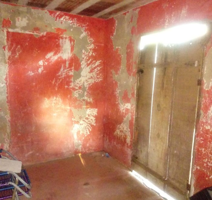 Cracks and light fixtures on the walls belie the need for renovation