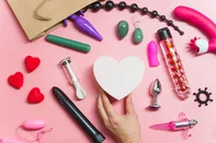 sex toy different objets with pink background<!-- NICAID(16076344) -->