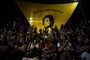 People attend the unveiling of the late human rights activist and councilwoman Marielle Franco's statue at the Buraco do Lume square, downtown Rio de Janeiro, Brazil, on July 27, 2022. (Photo by MAURO PIMENTEL / AFP)<!-- NICAID(15160321) -->