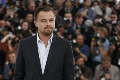 US actor Leonardo DiCaprio poses on May 15, 2013 during a photocall for the film "The Great Gatsby" ahead of the opening of the 66th edition of the Cannes Film Festival on May 15, 2013 in Cannes. Cannes, one of the world's top film festivals, opens on May 15 and will climax on May 26 with awards selected by a jury headed this year by Hollywood legend Steven Spielberg.       AFP PHOTO / VALERY HACHE<!-- NICAID(9383282) -->