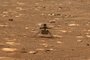 Esta foto da NASA mostra o helicóptero Ingenuity da NASA destravando suas pás do rotor, permitindo-lhes girar livremente, em 7 de abril de 2021, o 47º dia marciano, ou sol, da missão, capturado pelo imager Mastcam-Z no rover Perseverance Mars da NASA no sol seguinte, 8 de abril de 2021. - Eles foram mantidos no lugar desde antes do lançamento, e o desbloqueio é um dos vários marcos que devem ser cumpridos antes que o helicóptero possa tentar o primeiro vôo controlado e motorizado em outro planeta. A NASA tem como alvo, no máximo, domingo, 11 de abril, a primeira tentativa do Ingenuity Mars Helicopter em um vôo controlado e motorizado em outro planeta. Uma transmissão ao vivo confirmando o primeiro voo do Ingenuity está programado para começar por volta das 3h30 EDT de segunda-feira, 12 de abril. (Foto por Handout / NASA / JPL-Caltech / MSSS / AFP) / RESTRITO PARA USO EDITORIAL - CRÉDITO OBRIGATÓRIO "FOTO AFP / NASA / JPL-Caltech / MSSS "- SEM MARKETING - SEM CAMPANHAS DE PUBLICIDADE - DISTRIBUÍDO COMO UM SERVIÇO AOS CLIENTES<!-- NICAID(14755093) -->