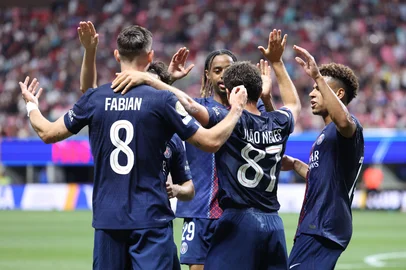 Paris Saint-Germain's Portuguese midfielder #87 Joao Pedro Goncalves Neves celebrates with teammates after scoring his second goal during the FIFA Club World Cup 2025 round of 16 football match between France's Paris Saint-Germain and US Inter Miami at the Mercedes-Benz Stadium in Atlanta on June 29, 2025. (Photo by CHARLY TRIBALLEAU / AFP)<!-- NICAID(16069750) -->