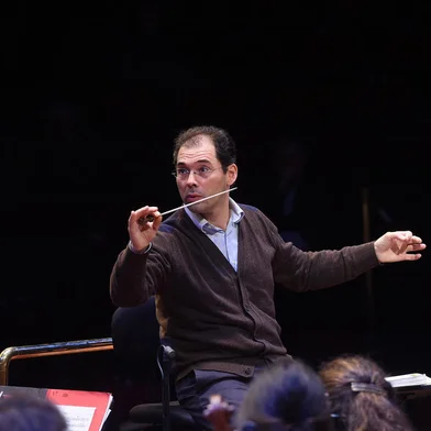 (FILES) This file photograph taken on March 4, 2016, shows Russian conductor Tugan Sokhiev rehearsing with the Orchestre national du Capitole of Toulouse at the Halle aux Grains venue in Toulouse, south-western France. - The Bolshoi Theatre's music director and principal conductor Tugan Sokhiev announced his resignation on March 6, 2022, saying he felt under pressure due to calls to take a position on the Ukraine conflict. (Photo by ERIC CABANIS / AFP)<!-- NICAID(15034613) -->