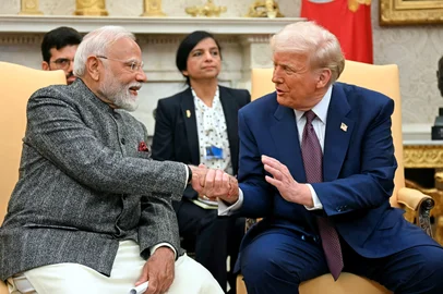 (FILES) US President Donald Trump shakes hands with Indian Prime Minister Narendra Modi in the Oval Office of the White House in Washington, DC, on February 13, 2025. President Trump on May 10, 2025, announced a ceasefire agreement between India and Pakistan following deadly attacks between the nuclear-armed rivals. "After a long night of talks mediated by the United States, I am pleased to announce that India and Pakistan have agreed to a FULL AND IMMEDIATE CEASEFIRE," Trump said on Truth Social, praising the two countries for "using Common Sense and Great Intelligence." (Photo by Jim WATSON / AFP)<!-- NICAID(16034487) -->