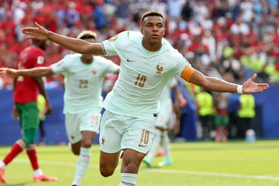 France's forward #10 Kylian Mbappe celebrates scoring his team's first goal during the 2026 World Cup football tournament quarter-final match between France and Morocco at Boston Stadium in Foxborough on July 9, 2026.  (Photo by Odd ANDERSEN / AFP)<!-- NICAID(16324557) -->