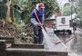Chuva não impede trabalho voluntário e limpeza de ruas em Santa Tereza