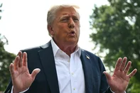 US President Donald Trump speaks to the press before boarding Marine One on the South Lawn of the White House in Washington, DC, on July 11, 2025. Trump is headed to Texas to tour the areas devastated by flash flooding over the Fourth of July weekend which left at least 120 people dead and 170 still missing. (Photo by ANDREW CABALLERO-REYNOLDS / AFP)<!-- NICAID(16081919) -->