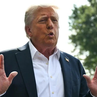 US President Donald Trump speaks to the press before boarding Marine One on the South Lawn of the White House in Washington, DC, on July 11, 2025. Trump is headed to Texas to tour the areas devastated by flash flooding over the Fourth of July weekend which left at least 120 people dead and 170 still missing. (Photo by ANDREW CABALLERO-REYNOLDS / AFP)<!-- NICAID(16081919) -->