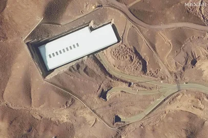 (FILES) This handout satellite image provided by Maxar Technologies and taken on February 12, 2025 shows an overview of the Fordo (Fordow) uranium enrichment facility, south of the capital Tehran. President Donald Trump said June 21, 2025 the US military has carried out a "very successful attack" on three Iranian nuclear sites, including the underground uranium enrichment facility at Fordow. (Photo by Satellite image ©2025 Maxar Technologies / AFP) / RESTRICTED TO EDITORIAL USE - MANDATORY CREDIT "AFP PHOTO / SATELLITE IMAGE ©2025 MAXAR TECHNOLOGIES " - NO MARKETING - NO ADVERTISING CAMPAIGNS - DISTRIBUTED AS A SERVICE TO CLIENTS - THE WATERMARK MAY NOT BE REMOVED/CROPPED / THE WATERMARK MAY NOT BE REMOVED/CROPPED<!-- NICAID(16064841) -->