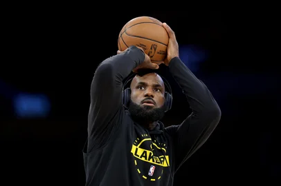 LOS ANGELES, CALIFORNIA - MAY 11: LeBron James #23 of the Los Angeles Lakers warms up prior to Game Four against Oklahoma City Thunder in the Second Round of the NBA Western Conference Playoffs at Crypto.com Arena on May 11, 2026 in Los Angeles, California. NOTE TO USER: User expressly acknowledges and agrees that, by downloading and or using this photograph, User is consenting to the terms and conditions of the Getty Images License Agreement.   Luke Hales/Getty Images/AFP (Photo by Luke Hales / GETTY IMAGES NORTH AMERICA / Getty Images via AFP)<!-- NICAID(16317137) -->