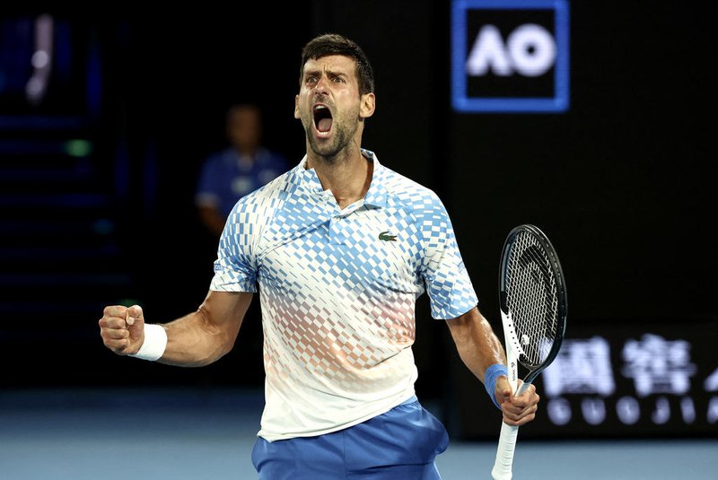 Serbia's Novak Djokovic reacts on a point against Russia's Andrey Rublev during their men's singles quarter-final match on day ten of the Australian Open tennis tournament in Melbourne on January 25, 2023. (Photo by DAVID GRAY / AFP) / -- IMAGE RESTRICTED TO EDITORIAL USE - STRICTLY NO COMMERCIAL USE --Editoria: SPOLocal: MelbourneIndexador: DAVID GRAYSecao: tennisFonte: AFPFotógrafo: STR<!-- NICAID(15331079) -->