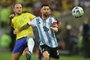 Brazil's defender Carlos Augusto (L) and Argentina's forward Lionel Messi fight for the ball during the 2026 FIFA World Cup South American qualification football match between Brazil and Argentina at Maracana Stadium in Rio de Janeiro, Brazil, on November 21, 2023. (Photo by CARL DE SOUZA / AFP)Editoria: SPOLocal: Rio de JaneiroIndexador: CARL DE SOUZASecao: soccerFonte: AFPFotógrafo: STF<!-- NICAID(15604939) -->