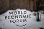A photograph shows a sign of the World Economic Forum (WEF) at the Congress centre on the opening day of the World Economic Forum (WEF) annual meeting in Davos on January 16, 2023. - The world's political and business elites gather for the annual Davos summit to promote "cooperation in a fragmented world", with war in Ukraine, the climate crisis and global trade tensions high on the agenda. (Photo by Fabrice COFFRINI / AFP)Editoria: POLLocal: DavosIndexador: FABRICE COFFRINISecao: diplomacyFonte: AFPFotógrafo: STF<!-- NICAID(15322462) -->