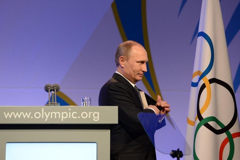 Russian President Vladimir Putin leaves the stage after his speech at the International Olympic Committee (IOC) Gala Dinner on February 6, 2014 in Sochi, on the eve of the Sochi 2014 Olympic Winter Games opening ceremony. - The International Olympic Committee on February 28, 2022, stripped Russian President Vladimir Putin of the Olympic Order award in response to the invasion of Ukraine. (Photo by ANDREJ ISAKOVIC / POOL / AFP)Editoria: SPOLocal: SochiIndexador: ANDREJ ISAKOVICSecao: sports eventFonte: POOLFotógrafo: STF<!-- NICAID(15030601) -->