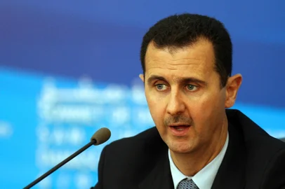 (FILES) Syrian President Bashar al-Assad speaks during a joint press conference with visiting foreign leaders in Damascus on September 4, 2008. Islamist-led rebels declared that they have taken Damascus in a lightning offensive on December 8, 2024, sending Assad fleeing and ending five decades of Baath rule in Syria. (Photo by AWAD AWAD / AFP)<!-- NICAID(15930927) -->