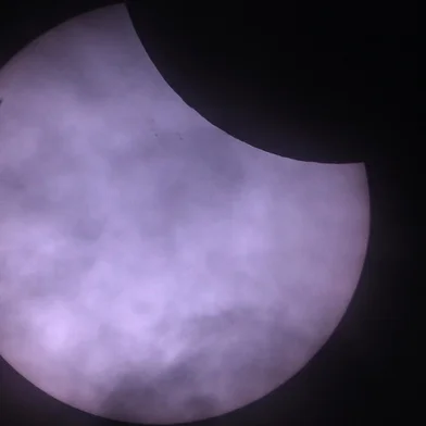 The moon passes in front of the sun during a partial solar eclipse, seen from Berlin, Germany, on March 29, 2025. Skygazers across a broad swathe of the Northern Hemisphere have a chance to see the Moon take a bite out of the Sun when a partial solar eclipse sweeps from eastern Canada to Siberia. Eclipses occur when the Sun, Moon and Earth all line up. When they perfectly align for a total solar eclipse, the Moon fully blots out the Sun's disc, creating an eerie twilight here on Earth. (Photo by RALF HIRSCHBERGER / AFP)<!-- NICAID(16006067) -->
