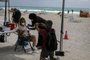 A woman gets a Johnson & Johnson Covid-19 vaccine at a pop-up vaccination center at the beach, in South Beach, Florida, on May 9, 2021. (Photo by Eva Marie UZCATEGUI / AFP)Editoria: HTHLocal: South BeachIndexador: EVA MARIE UZCATEGUISecao: diseaseFonte: AFPFotógrafo: STR<!-- NICAID(14779396) -->