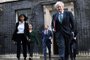 (FILES) In this file photo taken on December 15, 2020 Britain's Prime Minister Boris Johnson (R) leaves 10 Downing Street in London with Director of the Number 10 Policy Unit Munira Mirza (L) to attend the weekly cabinet meeting held at the nearby Foreign, Commonwealth and Development Office. - Influential aide to Boris Johnson, Munira Mirza, quit on Thursday, February 3, after the British prime minister made a widely debunked claim attacking the opposition Labour leader over a notorious paedophile. (Photo by Daniel LEAL / AFP)<!-- NICAID(15007958) -->