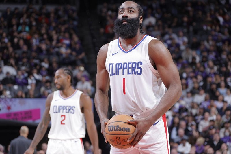 SACRAMENTO, CA - NOVEMBER 29: James Harden #1 of the LA Clippers shoots a free throw during the game against the Sacramento Kings on November 29, 2023 at Golden 1 Center in Sacramento, California. NOTE TO USER: User expressly acknowledges and agrees that, by downloading and or using this Photograph, user is consenting to the terms and conditions of the Getty Images License Agreement. Mandatory Copyright Notice: Copyright 2023 NBAE   Rocky Widner/NBAE via Getty Images/AFP (Photo by ROCKY WIDNER / NBAE / Getty Images / Getty Images via AFP)<!-- NICAID(15612995) -->