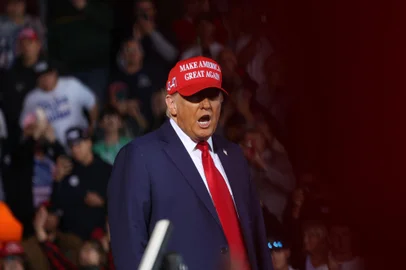 Former US President and Republican presidential candidate Donald Trump speaks during a campaign rally at the Dodge County airport in Juneau, Wisconsin, October 6, 2024. (Photo by alex wroblewski / AFP)<!-- NICAID(15886431) -->