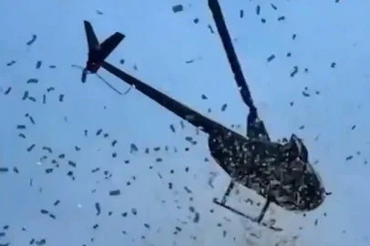 Cerca de US$ 5 mil (equivalente a pouco mais de R$ 27 mil) foram lançados de um helicóptero sobre a Avenida Gratiot, em Detroit, nos Estados Unidos, na última sexta-feira (27). O gesto fez parte de uma homenagem póstuma a Darrell Thomas, empresário local conhecido como "Plant", que morreu recentemente vítima de Alzheimer, aos 58 anos. A informação é do O Globo.<!-- NICAID(16072058) -->