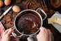 Top View of the process of cooking chocolate bakery pastry with melting chocolate. Ingredients for cooking chocolate Fonte: 207305702<!-- NICAID(15477007) -->
