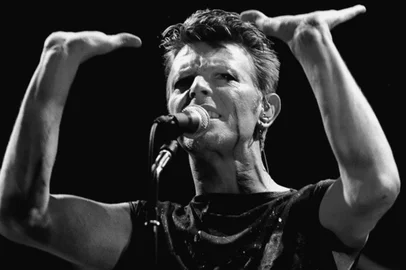 (FILES) A photo taken in May 1983 shows British rock music legend David Bowie performing on stage during a concert at the Festhalle in Frankfurt am Main, western Germany. Bowie has died after a long battle with cancer, his official Twitter and Facebook accounts said on January 11, 2016. The iconic musician had turned 69 only on January 8, which coincided with the release of "Blackstar", his 25th studio album. / AFP / DPA / Katja Lenz / Germany OUT<!-- NICAID(11938492) -->