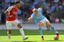 Manchester City's Norwegian striker Erling Haaland (R) vies with Arsenal's French defender William Saliba (L) during the English FA Community Shield football match between Arsenal and Manchester City at Wembley Stadium, in London, August 6, 2023. (Photo by Glyn KIRK / AFP) / NOT FOR MARKETING OR ADVERTISING USE / RESTRICTED TO EDITORIAL USEEditoria: SPOLocal: LondonIndexador: GLYN KIRKSecao: soccerFonte: AFPFotógrafo: STR<!-- NICAID(15507414) -->