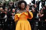 US actress Viola Davis waves as she arrives for the screening of the film "Top Gun : Maverick" during the 75th edition of the Cannes Film Festival in Cannes, southern France, on May 18, 2022. (Photo by PATRICIA DE MELO MOREIRA / AFP)<!-- NICAID(15102915) -->