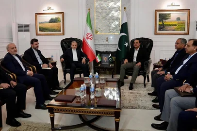 This handout photo released by the Iranian Foreign Ministry on April 25, 2026 shows Pakistan's Army Chief and Field Marshal Syed Asim Munir (3rd R) meeting with Iran's Foreign Minister Abbas Araghchi (3rd L) upon his arrival in Islamabad. US envoys headed to the Pakistani capital on April 25 in a bid to kickstart a new round of peace negotiations with Iran amid a fragile ceasefire, though the prospect of direct talks remained uncertain. (Photo by Iranian Foreign Ministry / AFP) / XGTY / RESTRICTED TO EDITORIAL USE - MANDATORY CREDIT "AFP PHOTO / Iranian Foreign Ministry" - HANDOUT - NO MARKETING NO ADVERTISING CAMPAIGNS - DISTRIBUTED AS A SERVICE TO CLIENTS<!-- NICAID(16272763) -->