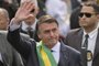 Brazilian President Jair Bolsonaro waves during a military parade to mark Brazil's 200th anniversary of independence in Brasilia, on September 7, 2022. (Photo by EVARISTO SA / AFP)Editoria: SCILocal: BrasíliaIndexador: EVARISTO SASecao: human scienceFonte: AFPFotógrafo: STF<!-- NICAID(15199032) -->