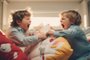 Siblings having fight with pillows at home. Concept of conflict and family relation.Siblings having fight with pillows at home. Concept of conflict and family relation.Fonte: 678870189<!-- NICAID(15651929) -->