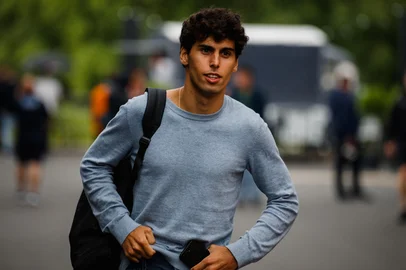 Kick Sauber's Brazilian driver Gabriel Bortoleto walks on the paddock three days ahead of the Formula One Grand Prix of Belgium at the Spa-Francorchamps circuit in Francorchamps, on July 24, 2025. (Photo by Dimitar DILKOFF / AFP)<!-- NICAID(16087280) -->