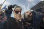 (FILES) In this file photo taken on August 04, 2016, Hebe de Bonafini, leader of the Mothers of Plaza de Mayo human rights organization, flashes the "v" sign as she leaves Plaza de Mayo square in Buenos Aires, Argentina. - Hebe de Bonafini, the historic president of the Argentine association Madres de Plaza de Mayo, formed during the dictatorship (1976-1983) to find out the fate of her children and other detainees disappeared by the military regime, died on November 20, 2022, at the age of 93, confirmed Vice President Cristina Fernández de Kirchner. (Photo by EITAN ABRAMOVICH / AFP)<!-- NICAID(15270513) -->