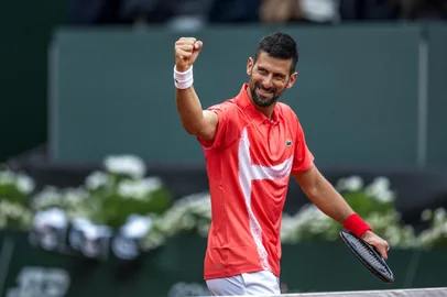 Serbia's Novak Djokovic celebrates his victory at the end of his match against Hungary's Marton Fucsovics at the ATP 250 Geneva Open tennis tournament in Geneva on May 21, 2025. (Photo by FABRICE COFFRINI / AFP)<!-- NICAID(16042784) -->