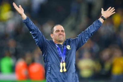 America's Brazilian coach Andre Jardine celebrates after the Liga MX Apertura tournament final second-leg football match between Monterrey and America at the BBVA Stadium in Monterrey, Nuevo Leon State, Mexico on December 15, 2024. (Photo by Julio Cesar AGUILAR / AFP)<!-- NICAID(15936372) -->