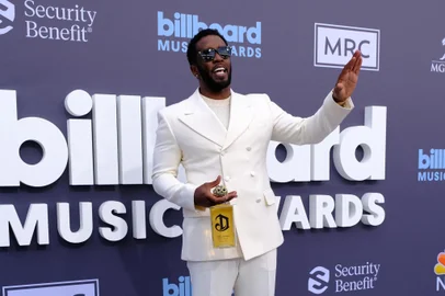 (FILES) US producer-musician Sean "Diddy" Combs attends the 2022 Billboard Music Awards at the MGM Grand Garden Arena in Las Vegas, Nevada, May 15, 2022. Combs will plead not guilty on September 17, 2024, to racketeering and sex trafficking charges, his lawyer said ahead of a court appearance by the superstar rapper. Combs, 54, was arrested on September 16 by federal agents acting on a sealed indictment filed by the US Attorney for the Southern District of New York. (Photo by Maria Alejandra CARDONA / AFP)<!-- NICAID(15874781) -->