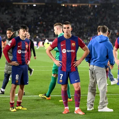 Barcelona's Spanish midfielder #08 Pedri, Barcelona's Spanish forward #07 Ferran Torres and Barcelona's Polish forward #09 Robert Lewandowski react at the end of the UEFA Champions League quarter-final second leg football match between FC Barcelona and Paris SG at the Estadi Olimpic Lluis Companys in Barcelona on April 16, 2024. (Photo by Josep LAGO / AFP)Editoria: SPOLocal: BarcelonaIndexador: JOSEP LAGOSecao: soccerFonte: AFPFotógrafo: STR<!-- NICAID(15736648) -->