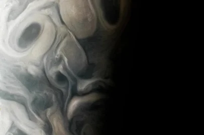 On Sept. 7, 2023, during its 54th close flyby of Jupiter, NASA’s Juno mission captured this view of an area in the giant planet’s far northern regions called Jet N7. The image shows turbulent clouds and storms along Jupiter’s terminator, the dividing line between the day and night sides of the planet. The low angle of sunlight highlights the complex topography of features in this region, which scientists have studied to better understand the processes playing out in Jupiter’s atmosphere.<!-- NICAID(15589180) -->