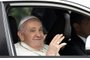 Pope Francis waves from his car window as he leaves after landing at the Figo Maduro air base in Lisbon to attend the World Youth Day (WYD) gathering of young Catholics, on August 2, 2023. Pope Francis arrived in Lisbon today to gather with a million youngsters from across the world at the World Youth Day (WYD), held as the Church reflects on its future. The 86-year-old underwent major abdominal surgery just two months ago, but that has not stopped an event-packed 42nd trip abroad, with 11 speeches and around 20 meetings scheduled. (Photo by Patricia DE MELO MOREIRA / AFP)Editoria: RELLocal: LisbonIndexador: PATRICIA DE MELO MOREIRASecao: popeFonte: AFPFotógrafo: STF<!-- NICAID(15498638) -->