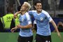 Uruguay's Nicolas Lodeiro (L) celebrates with teammate Edinson Cavani after scoring against Ecuador during their Copa America football tournament group match at the Mineirao Stadium in Belo Horizonte, Brazil, on June 16, 2019. (Photo by Luis ACOSTA / AFP)Editoria: SPOLocal: Belo HorizonteIndexador: LUIS ACOSTASecao: soccerFonte: AFPFotógrafo: STF<!-- NICAID(14125387) -->