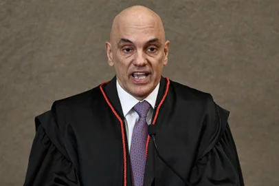 President of the Superior Electoral Court (TSE) Alexandre de Moraes delivers a speech during the certification ceremony of Brazil's President-elect Luis Inacio Lula da Silva at the TSE headquarters in Brasilia, December 12, 2022. - Luiz Inacio Lula da Silva received this Monday the "diploma" of President-elect from the highest electoral authority in Brazil, which formalizes his path to take office on January 1, 2023. (Photo by EVARISTO SA / AFP)<!-- NICAID(15293293) -->