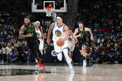 NEW ORLEANS, LA - FEBRUARY 24: Gui Santos #15 of the Golden State Warriors drives to the basket during the game against the New Orleans Pelicans on February 24, 2026 at the Smoothie King Center in New Orleans, Louisiana. NOTE TO USER: User expressly acknowledges and agrees that, by downloading and or using this Photograph, user is consenting to the terms and conditions of the Getty Images License Agreement. Mandatory Copyright Notice: Copyright 2026 NBAE   Layne Murdoch Jr./NBAE via Getty Images/AFP (Photo by Layne Murdoch Jr. / NBAE / Getty Images / Getty Images via AFP)<!-- NICAID(16232239) -->